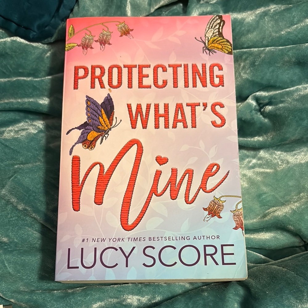 Protecting What's Mine by Lucy Score